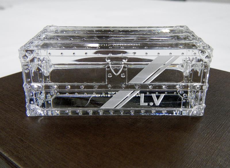 Interesting items for January include Louis Vuitton VIP crystal paperweight and a Skeleton in ...