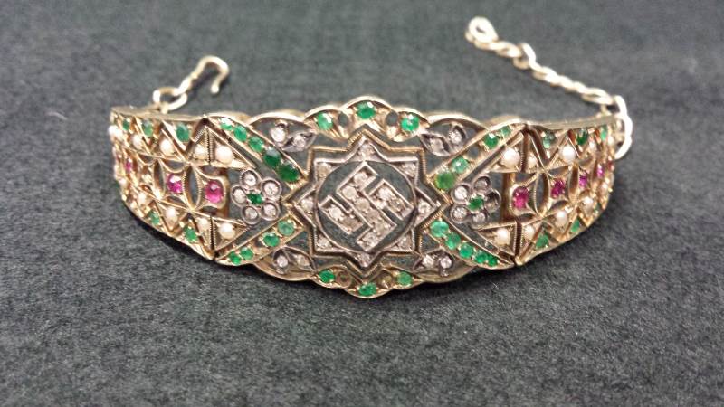 Bracelet with Nazi Swastika symbol decorated with rubies, diamonds, emeralds and pearls