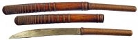 A 19th century Burmese Dha dagger short sword with a single edged slightly curved steel blade