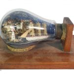 miniature scene in lightbulb