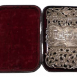A cased Nathaniel Mills silver card case featuring Windsor Castle and Abbotsford House, Birmingham 1844